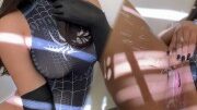 Hot brunette in sexy spider woman costume fingering till big squirting