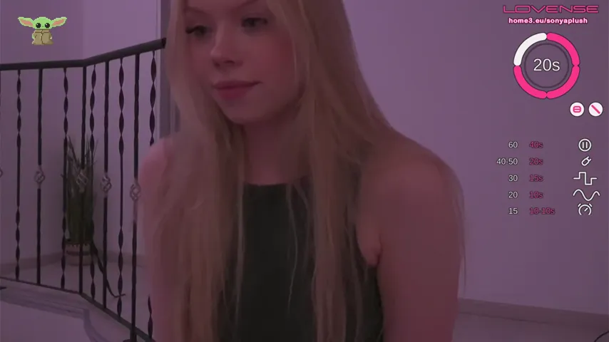 Soft Robe Reveals: Blonde Beauty Indulges in Anal Play on a Luxurious Couch