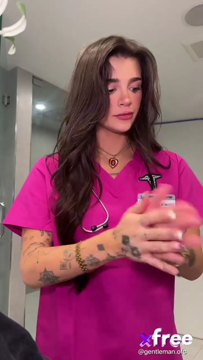 Naughty Nurse: Gorgeous Brunette in Pink Scrubs Gets Intimate with Her Dildo