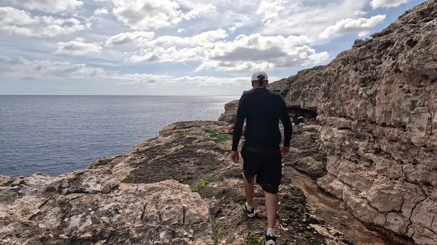 Tyra Takes the Plunge: Inked MILF Goes Wild on the Cliff