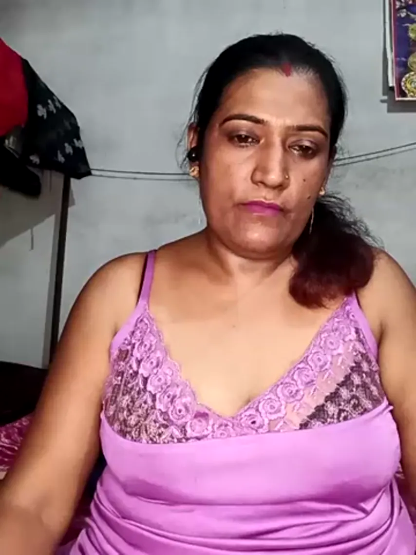 Caught on Cam: The Allure of a Web Milf in Her Dress