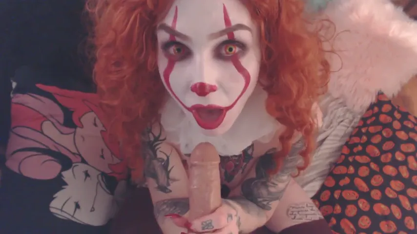 Clowning Around: POV Blowjob with a Fiery Redhead in a Wild Amateur Scene