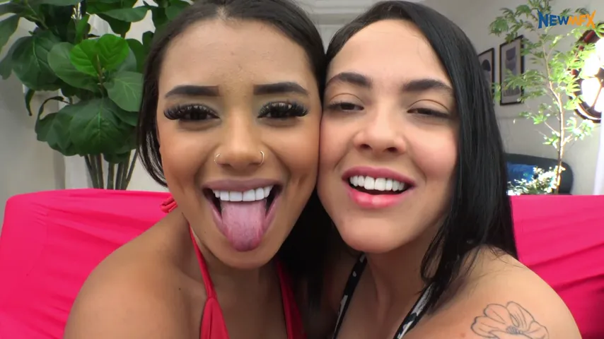 Intense Connection: Brunette and Latina Locked in a Passionate Kiss