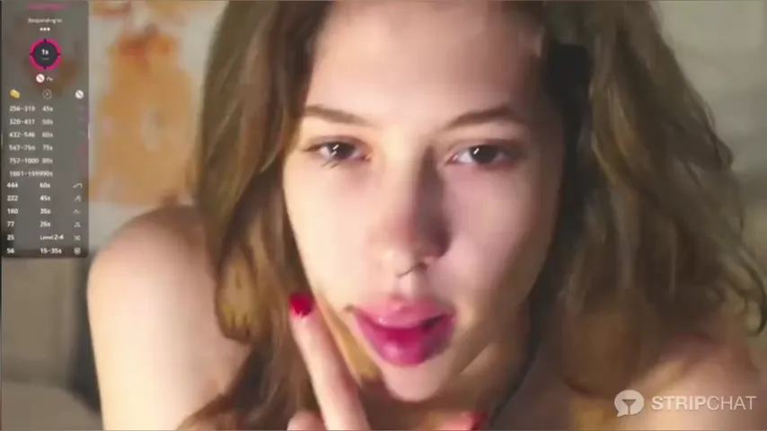 Aida Jonesi Unleashed: Webcam Tease with Big Tits and Raw Energy